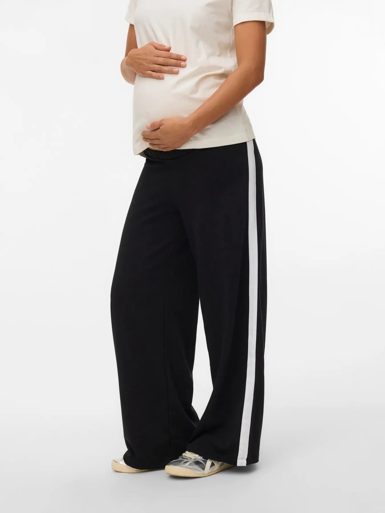 Jerseyhose mit weitem Bein für die Schwangerschaft. Weißer Streifen an der Seite. Miete online bei Mutterkleid.